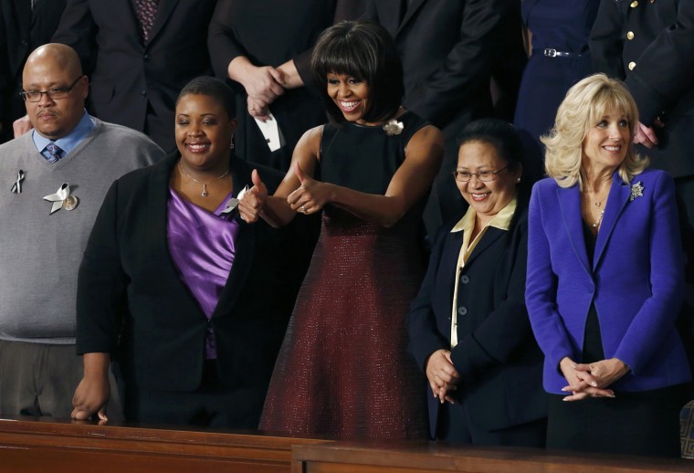 Image: First lady Michelle Obama gives thumbs up before State of the Union speech in Washington